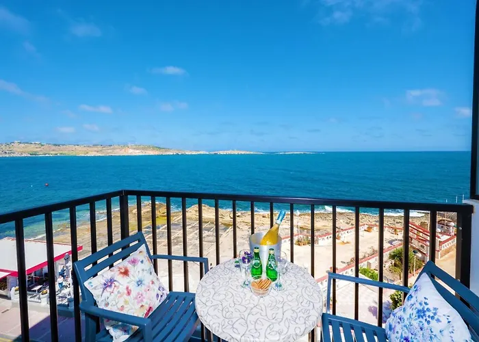 Islet Promenade Seafront Family Apartment With 2 Balconies By Getawaysmalta